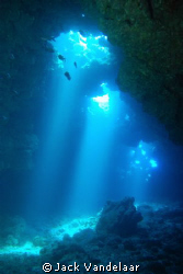 Cavern off Maui-  natural light coming from the top, make... by Jack Vandelaar 